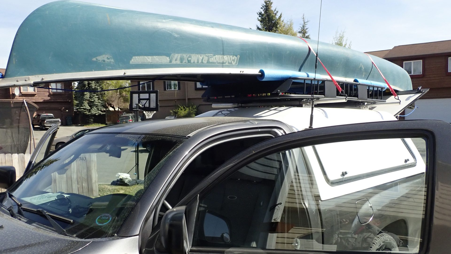Canoe attached upside down on Toyota pickup truck
