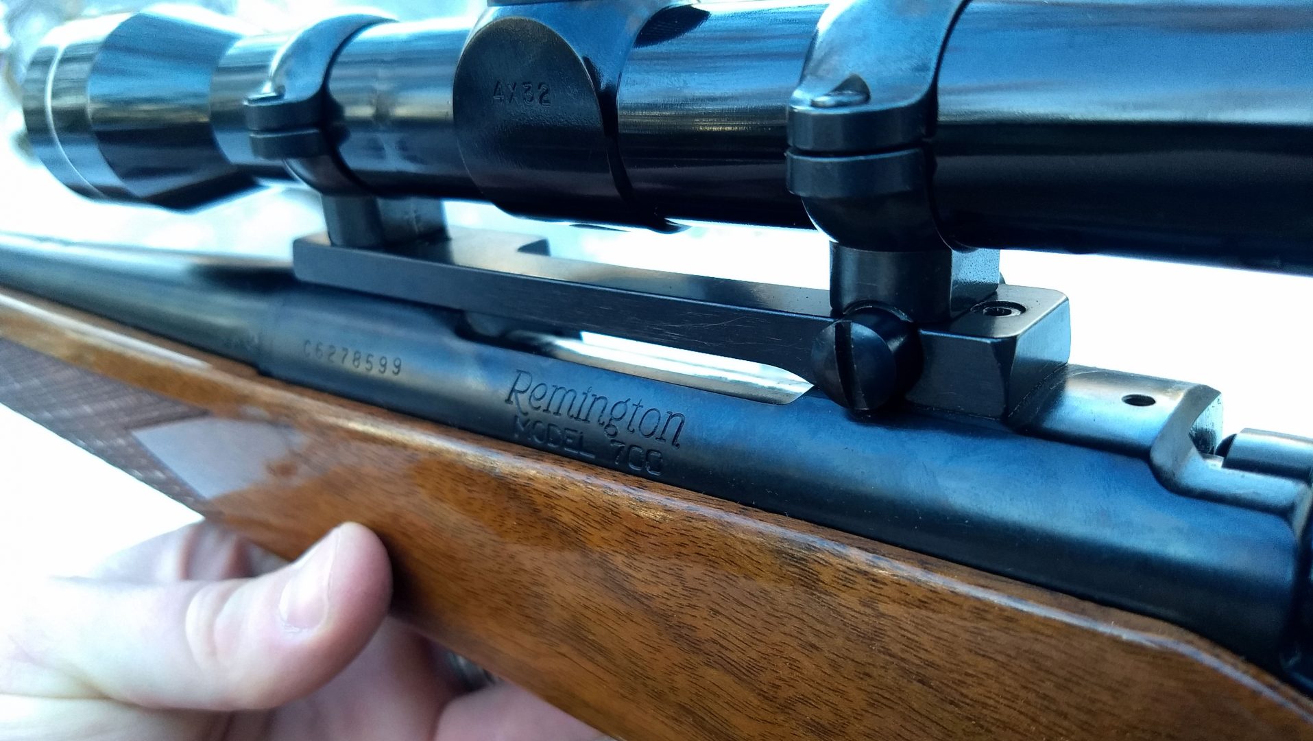 Remington model 700 short action rifle with wood stock